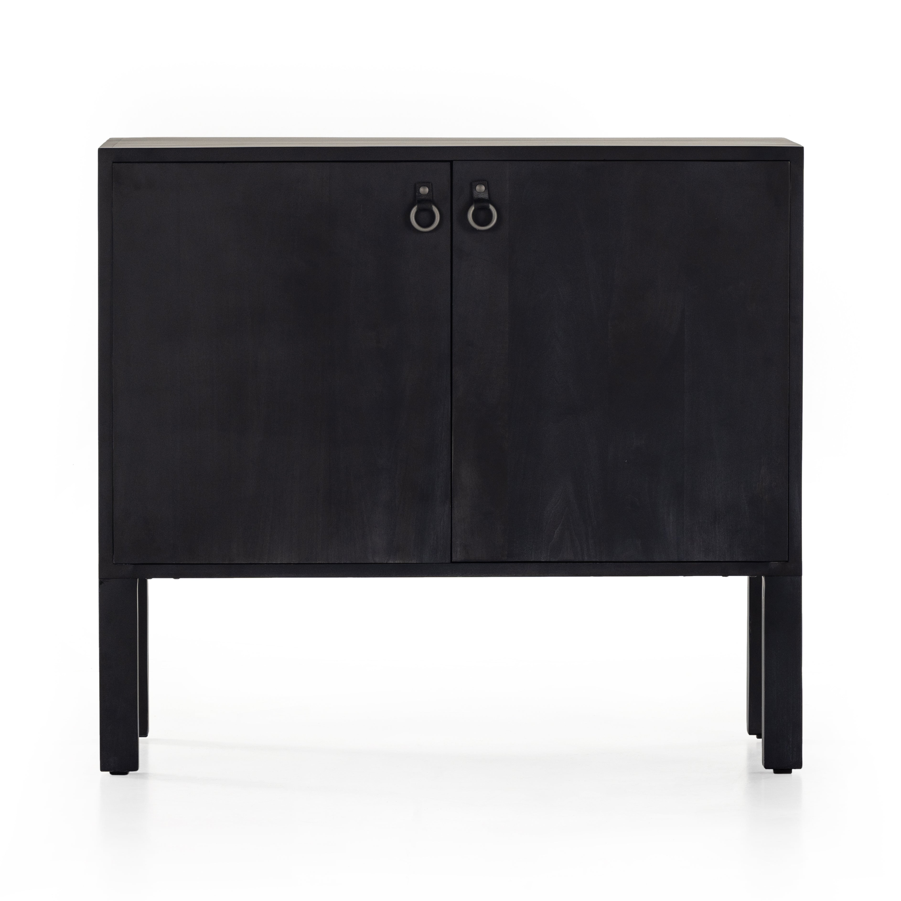 Featuring Isador Black Wash Poplar Bar Cabinet by Four Hands at Amethyst Home. Beautifully simple in spirit. Black-washed solid poplar forms a Parsons-style bar cabinet, with iron and leather hardware for a material-driven update to Shaker-inspired styling. Inside, dual drawers plus generous bottle storage await drink go-tos and bar accessories.Overall Dimensions: 36"W x 19"L x . Amethyst Home provides interior design, new construction, custom furniture, and area rugs in the Washington metro area.