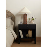 Gather sweet dreams with the Isador Black Wash Poplar Nightstand. The sleek and refined design is perfect for any bedroom. The rich black wash finish creates a timeless look, sure to add elegance and comfort to any décor. Amethyst Home provides interior design, new construction, custom furniture, and area rugs in the Alpharetta metro area.