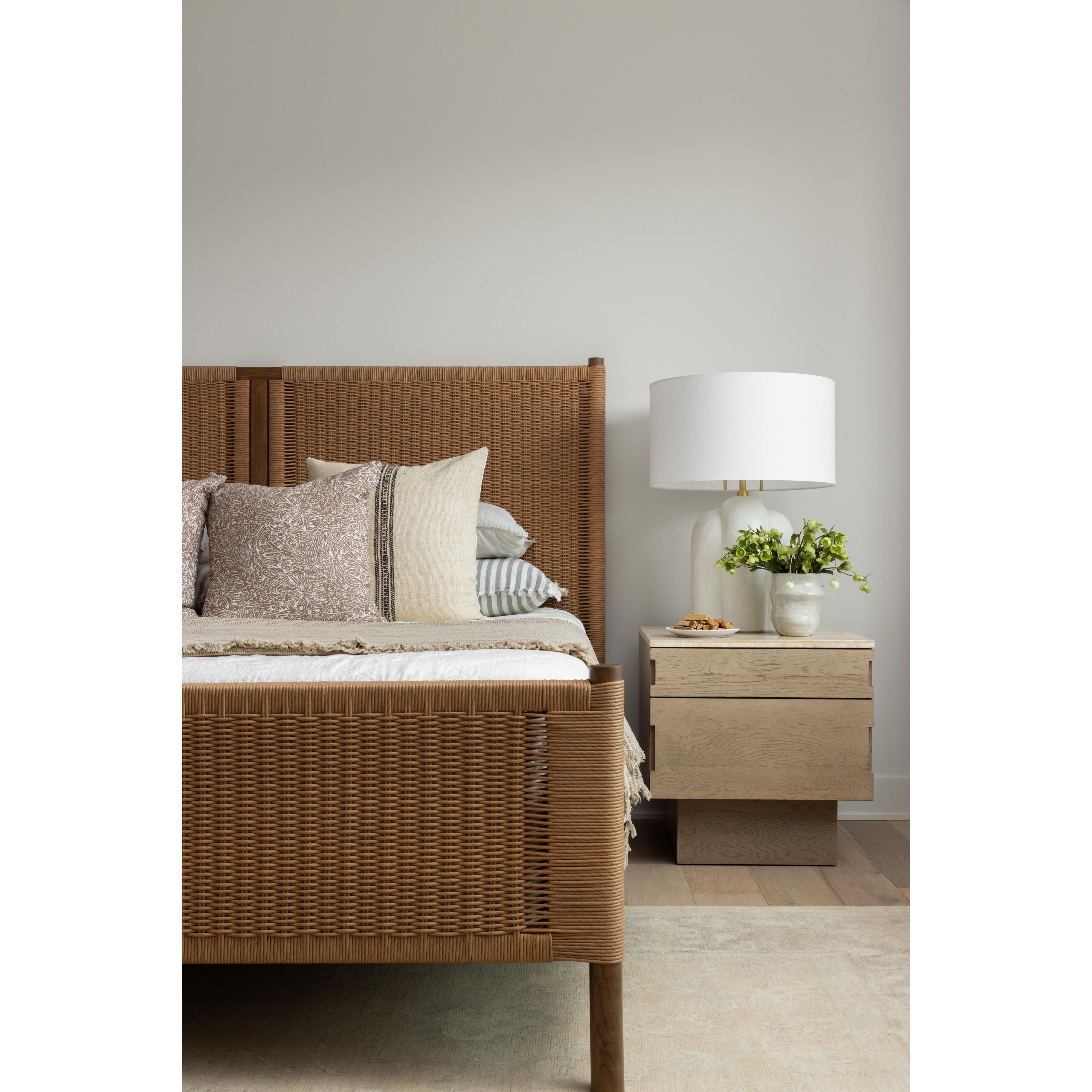 Introducing the Jaylen Nightstand in Yucca Oak, a must-have addition to any modern coastal-inspired bedroom design. Pair it with white plaster lighting and a Turkish oushak rug for a cohesive look in your Nashville, Florida, or Utah home design. Elevate your bedroom with the Jaylen Nightstand and enjoy its perfect blend of style and functionality. Add it to your space and enjoy the convenience of extra storage space and a sleek design at your bedside.