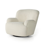 Kadon Natural Swivel Chair is a high wing back pairs with softly rolled arms for a curvy look and supportive sit. Cream-colored shearling-upholstered seating tops a 360-degree swivel. Amethyst Home provides interior design services, furniture, rugs, and lighting in the Kansas City metro area.