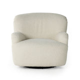Kadon Natural Swivel Chair is a high wing back pairs with softly rolled arms for a curvy look and supportive sit. Cream-colored shearling-upholstered seating tops a 360-degree swivel. Amethyst Home provides interior design services, furniture, rugs, and lighting in the Monterey metro area.