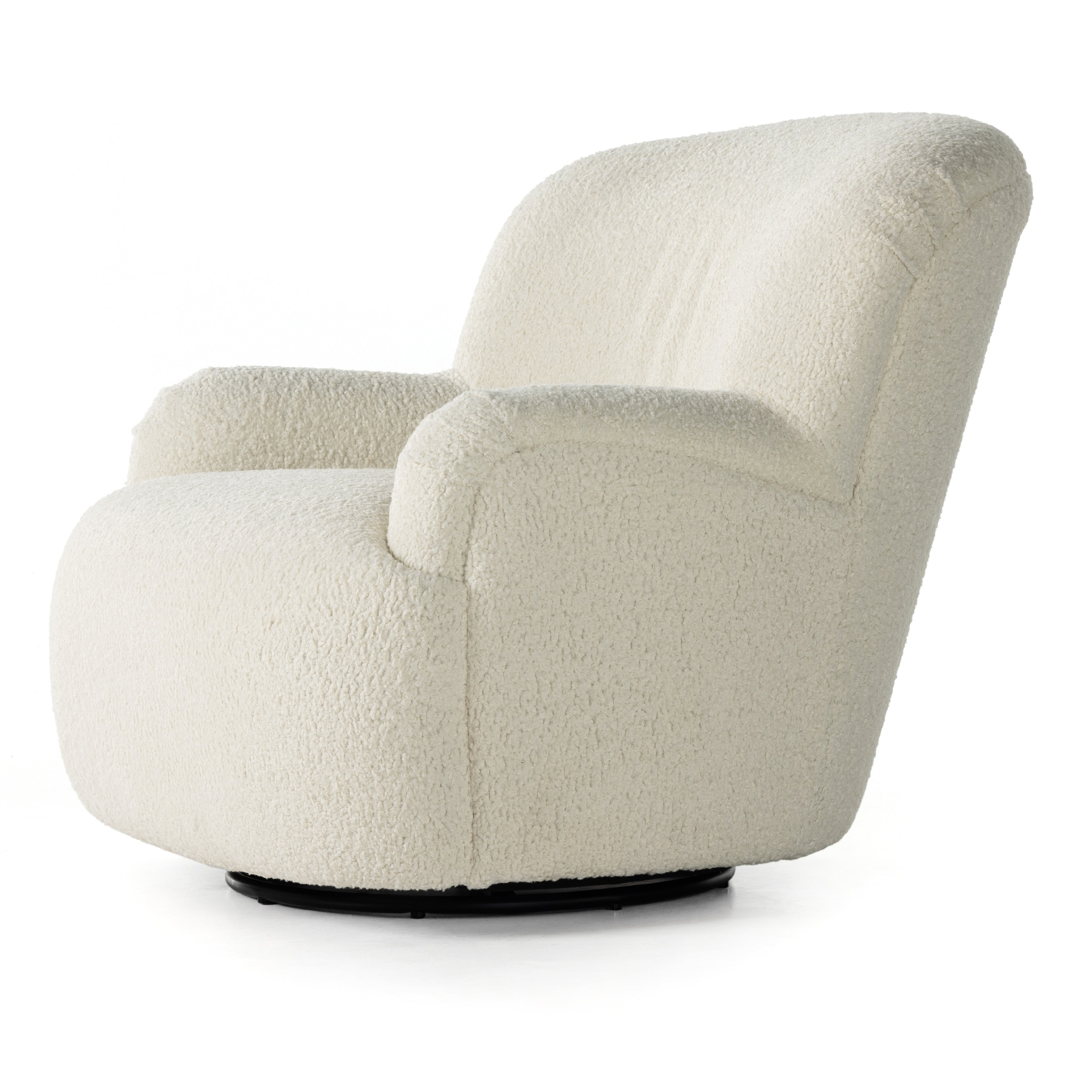 Kadon Natural Swivel Chair is a high wing back pairs with softly rolled arms for a curvy look and supportive sit. Cream-colored shearling-upholstered seating tops a 360-degree swivel. Amethyst Home provides interior design services, furniture, rugs, and lighting in the Omaha metro area.