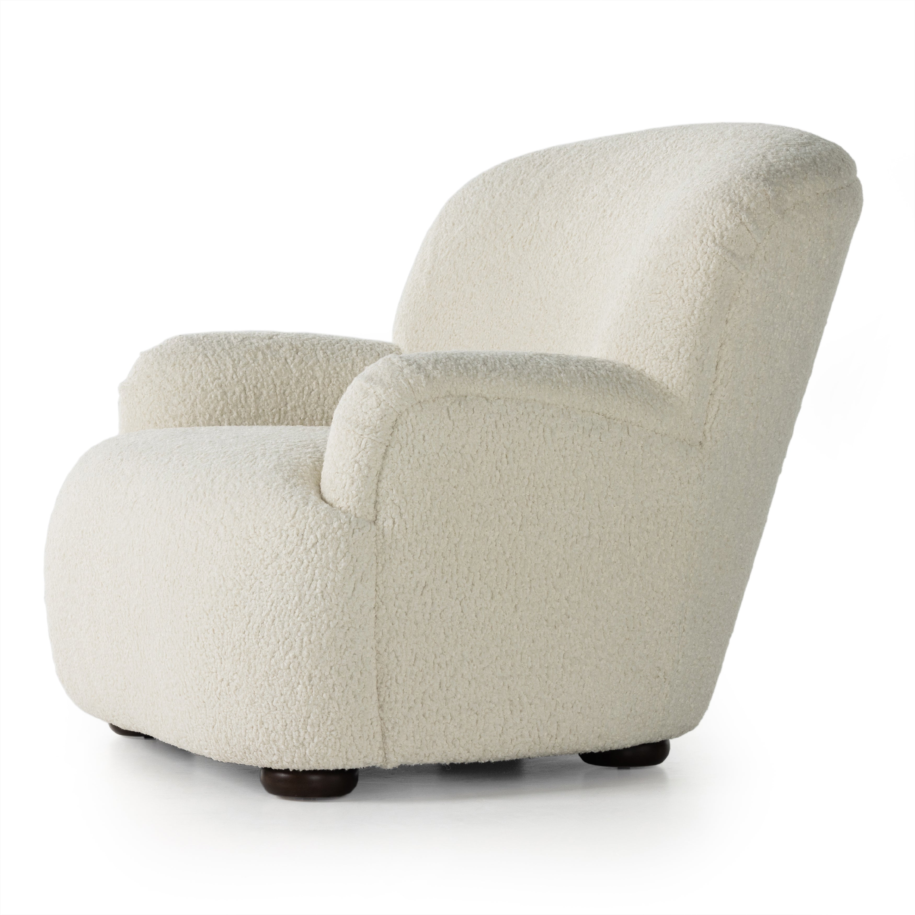 Kadon Sheepskin Natural Chair's high wing back pairs with softly rolled arms for a curvy look and supportive sit. Cream shearling-like upholstery invites you to sit and stay a while Amethyst Home provides interior design services, furniture, rugs, and lighting in the Omaha metro area.
