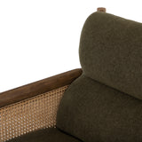 Craft a Parisian air with French-inspired seating. With a chenille-like texture and earthy olive hue, high performance-upholstered seating is perfectly positioned for comfort, with parawood framing and woven sides of natural cane. Performance fabrics are specially created to withstand spills, stains, high traffic and wear, ensuring long-term comfort and unmatched durability. Amethyst Home provides interior design, new construction, custom furniture and area rugs in the Tampa metro area