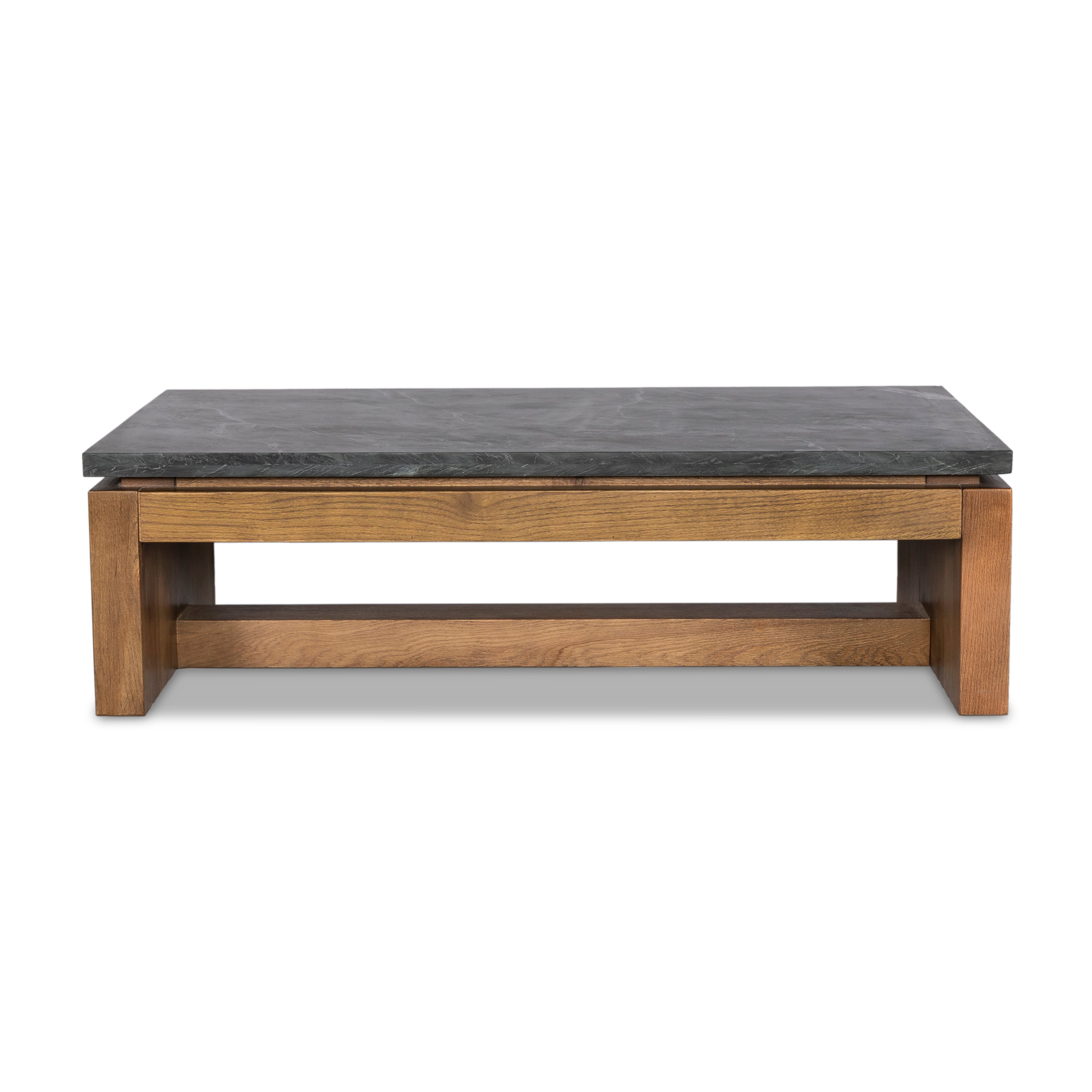 Mixed materials update this waterfall-style coffee table, as a warm oak base pairs with a sleek black marble tabletop. Amethyst Home provides interior design, new construction, custom furniture, and area rugs in the Omaha metro area.