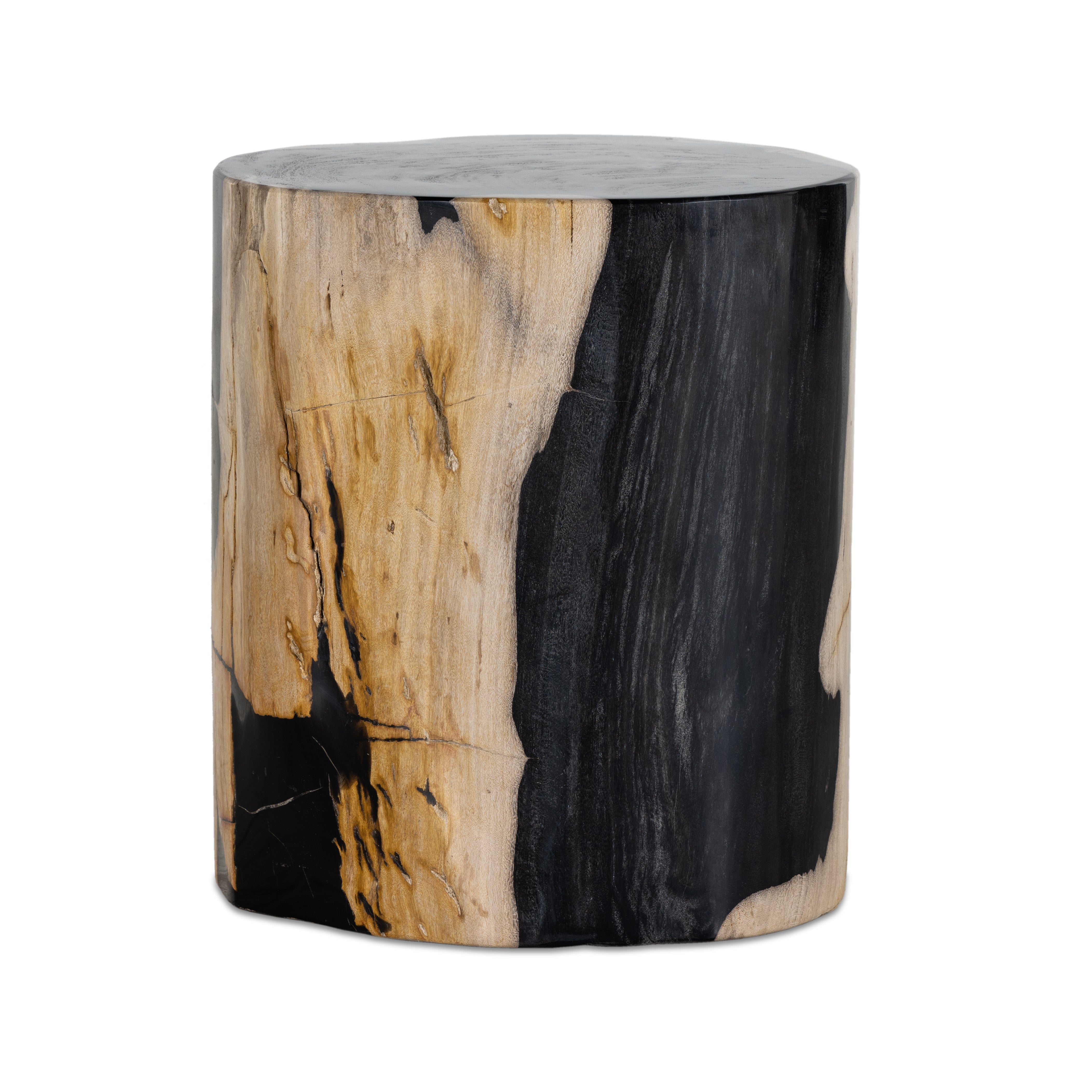 Naturally petrified wood with dramatic highs and lows makes for a stunning end table. Showcasing organic patterns with cracks and graining, the lightly hued tree stump has a rich, organic look. A variance in color and texture is to be expected from piece to piece. Amethyst Home provides interior design, new construction, custom furniture, and area rugs in the Omaha metro area.