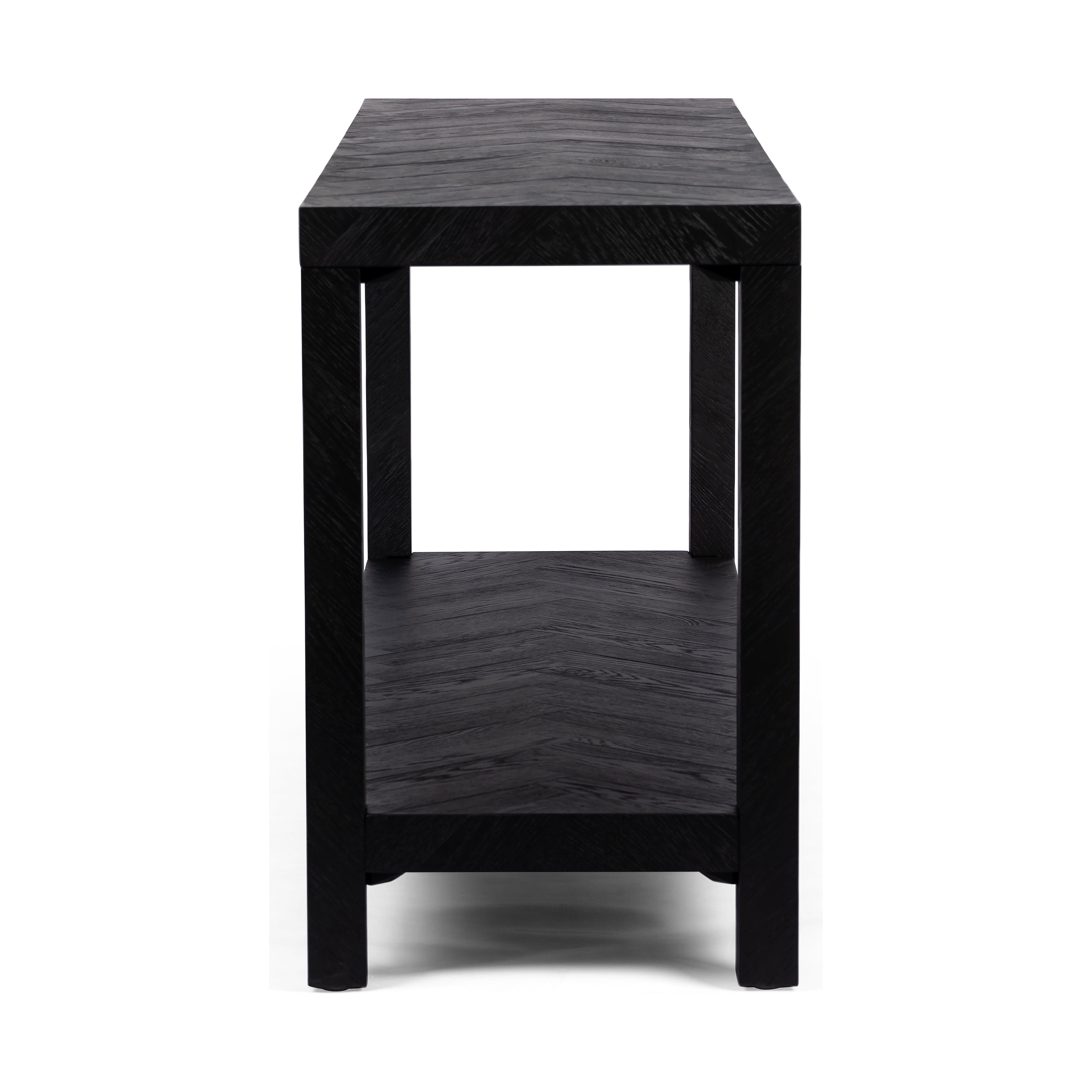 The simplest answer is often the right one. This deceptively simple Parsons-style table offers grandly exaggerated dimensions and a subtle, herringbone parquet pattern on every surface. Amethyst Home provides interior design, new construction, custom furniture, and area rugs in the Scottsdale metro area.
