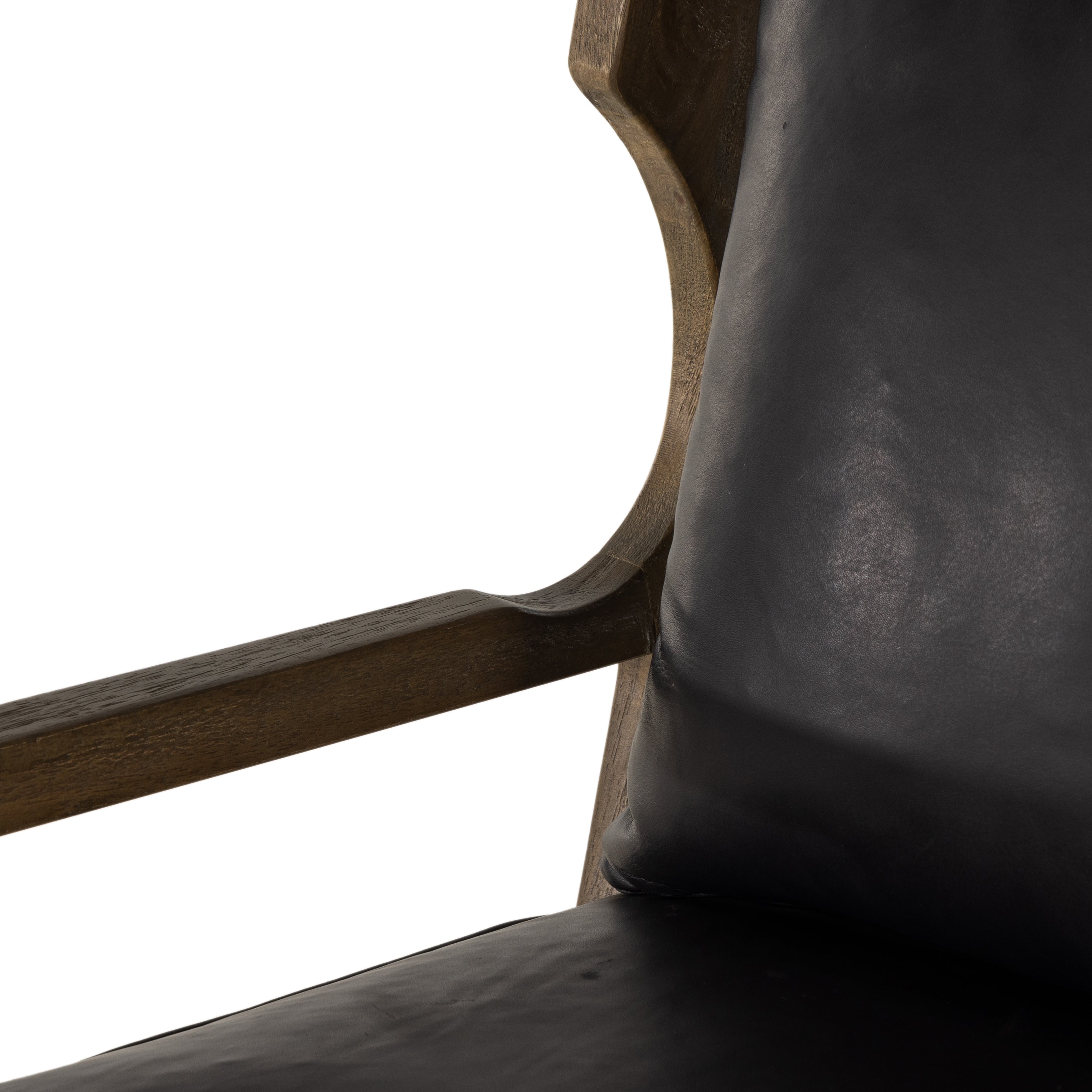 A solid frame of warm oak features a high, ladder back design for a regal air. Upholstered in heirloom black leather. Sourced from one of the oldest family-owned tanneries in Italyâ€™s Bassano del Grappa, heirloom leather is salvaged and processed from upcycled hides featuring an abundance of natural markings, scars and color variations. Amethyst Home provides interior design, new construction, custom furniture, and area rugs in the Laguna Beach metro area.