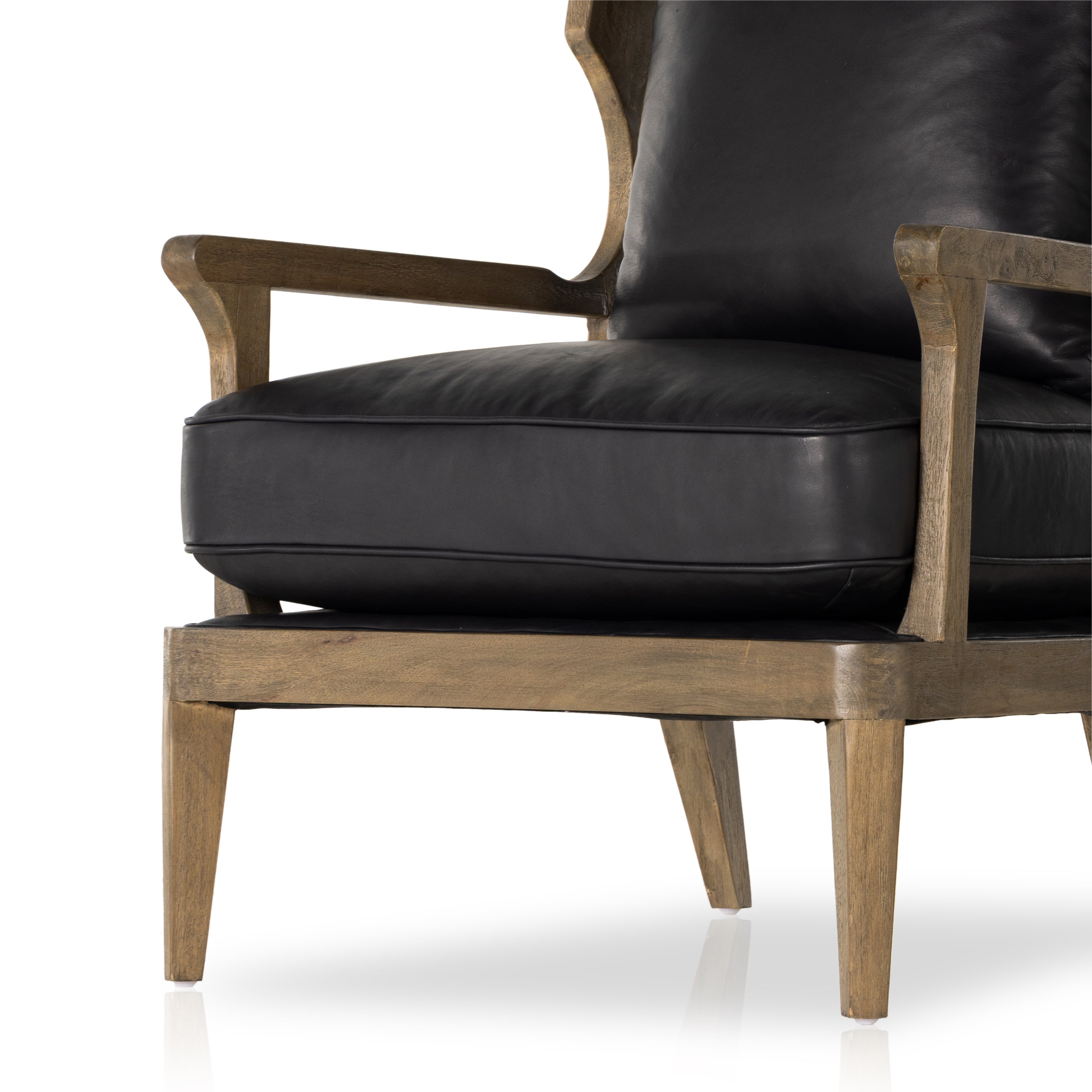 A solid frame of warm oak features a high, ladder back design for a regal air. Upholstered in heirloom black leather. Sourced from one of the oldest family-owned tanneries in Italyâ€™s Bassano del Grappa, heirloom leather is salvaged and processed from upcycled hides featuring an abundance of natural markings, scars and color variations. Amethyst Home provides interior design, new construction, custom furniture, and area rugs in the Newport Beach metro area.