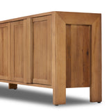 Inspired by Swedish folk design, natural elm crafts the frame and panel structure of this sideboard. Designed without hardware, the raised panels of the doors have a cutout to serve as handles, offering a clean appearance that offers practical function. Amethyst Home provides interior design, new construction, custom furniture, and area rugs in the Charlotte metro area.