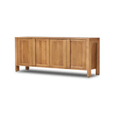 Inspired by Swedish folk design, natural elm crafts the frame and panel structure of this sideboard. Designed without hardware, the raised panels of the doors have a cutout to serve as handles, offering a clean appearance that offers practical function. Amethyst Home provides interior design, new construction, custom furniture, and area rugs in the Des Moines metro area.