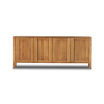 Inspired by Swedish folk design, natural elm crafts the frame and panel structure of this sideboard. Designed without hardware, the raised panels of the doors have a cutout to serve as handles, offering a clean appearance that offers practical function. Amethyst Home provides interior design, new construction, custom furniture, and area rugs in the Miami metro area.