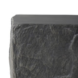Cast black concrete features heavily textured sides that resemble natural slate, paired with a smoothed tabletop.Collection: Chandle Amethyst Home provides interior design, new home construction design consulting, vintage area rugs, and lighting in the Omaha metro area.