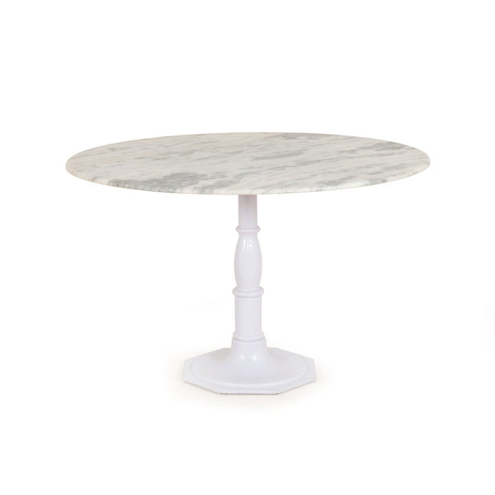 The Lucy Nimbus White Round Dining Table beautifully captures the French industrial meets dining table vibe. Beautifully detailed, 8-sided cast iron pedestal supports a dramatic white marble top with a bull-nosed edge. Amethyst Home provides interior design services, furniture, rugs, and lighting in the Miami metro area