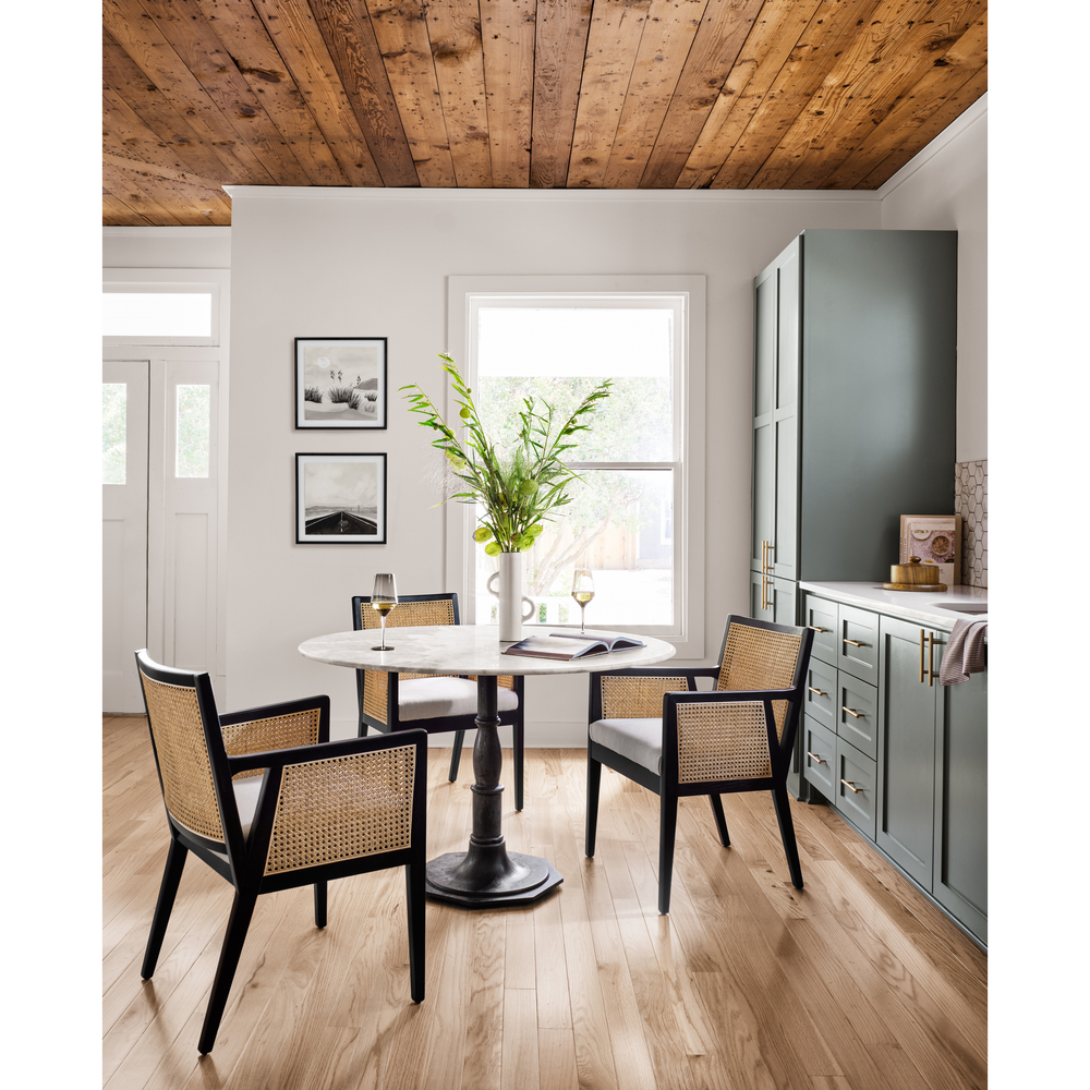 Featuring Lucy Carbon Wash Round Dining Table by Four Hands at Amethyst Home. The Lucy Carbon Wash Round Dining Table beautifully captures the French industrial meets dining table vibe. Beautifully detailed, 8-sided cast iron pedestal supports a dramatic white marble top with a bull-nosed edge.
Size: 48"w x 48"d x 30"hWeight: 227.17 lbs
Size: 60"w x 6.  Amethyst Home provides interior design, new home construction design consulting, vintage area rugs, and lighting in the Salt Lake City metro area.