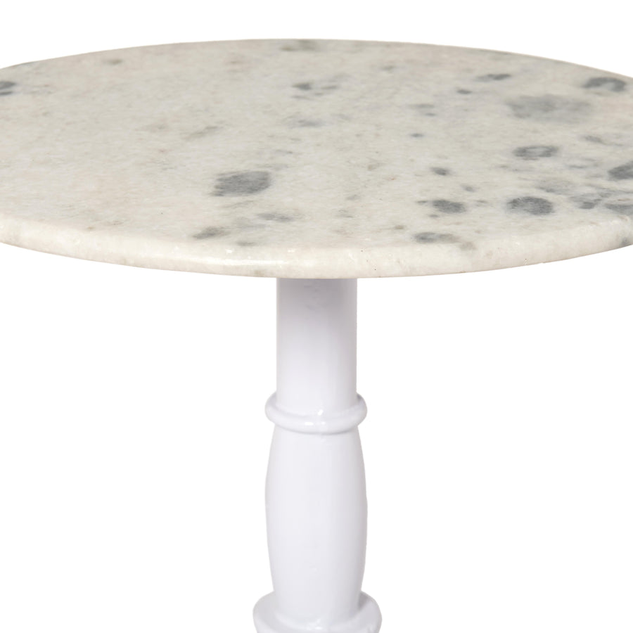 Upgrade your home decor with the Lucy White Marble Side Table. This stylish piece features a solid marble top paired with a nimbus white cast iron base, inspired by French industrial design. Enjoy the timeless beauty of marble in classic and modern spaces. Amethyst Home provides interior design, new home construction design consulting, vintage area rugs, and lighting in the Washington metro area.