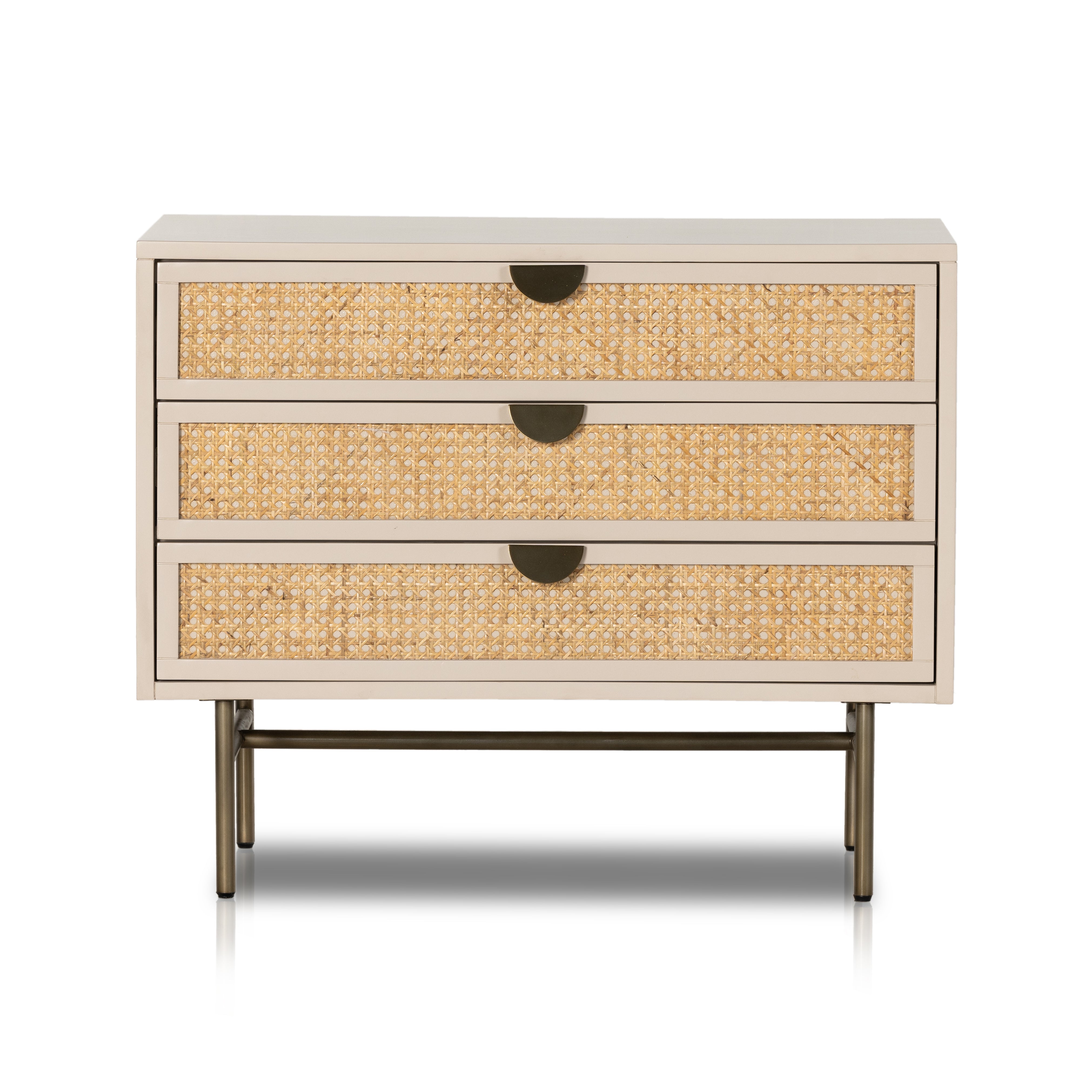 Bring a light, textural look to bedside storage. A lacquered three-drawer nightstand features woven cane panels and half-moon hardware finished in an aged brass. Amethyst Home provides interior design, new construction, custom furniture, and area rugs in the Washington metro area.