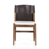 Sleek, streamlined seating with a midcentury vibe. Lulu Espresso Leather Armless Dining Chair features a sling leather seatback and a faux shearling seat in liquid-repellent performance fabric. Frame and legs made of solid ash wood. Amethyst Home provides interior design services, furniture, rugs, and lighting in the Salt Lake City metro area.