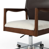 Sleek, streamlined seating with a midcentury vibe. Desk chair features a faux leather seatback and a faux shearling seat in liquid-repellent performance fabric. Subtly curved arms, frame and legs made of solid ash wood atop a 360 swivel. Amethyst Home provides interior design, new home construction design consulting, vintage area rugs, and lighting in the Seattle metro area.