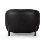 This updated take on the traditional tub chair pairs rich black top-grain leather with solid ash to shape a sculpted seat with exaggerated depth. Sourced from one of the oldest family-owned tanneries in Italyâ€™s Bassano del Grappa, heirloom leather is salvaged and processed from upcycled hides featuring an abundance of natural markings, scars and color variations. Amethyst Home provides interior design, new construction, custom furniture, and area rugs in the Salt Lake City metro area.
