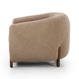 Lyla Sheepskin Camel Chair is a fresh take on the traditional tub chair, with exaggerated depth for drama and comfort. Solid wood legs intersect sheepskin upholstery for clean contrast and scale. Amethyst Home provides interior design services, furniture, rugs, and lighting in the Calabasas metro area.
