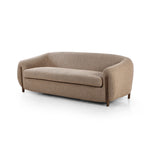 Lyla Sheepskin Camel Sofa is a fresh, elongated take on the traditional tub chair, with exaggerated depth for drama and comfort. Solid wood legs intersect sheepskin upholstery on this plush sofa for clean contrast and scale. Amethyst Home provides interior design services, furniture, rugs, and lighting in the Dallas metro area.