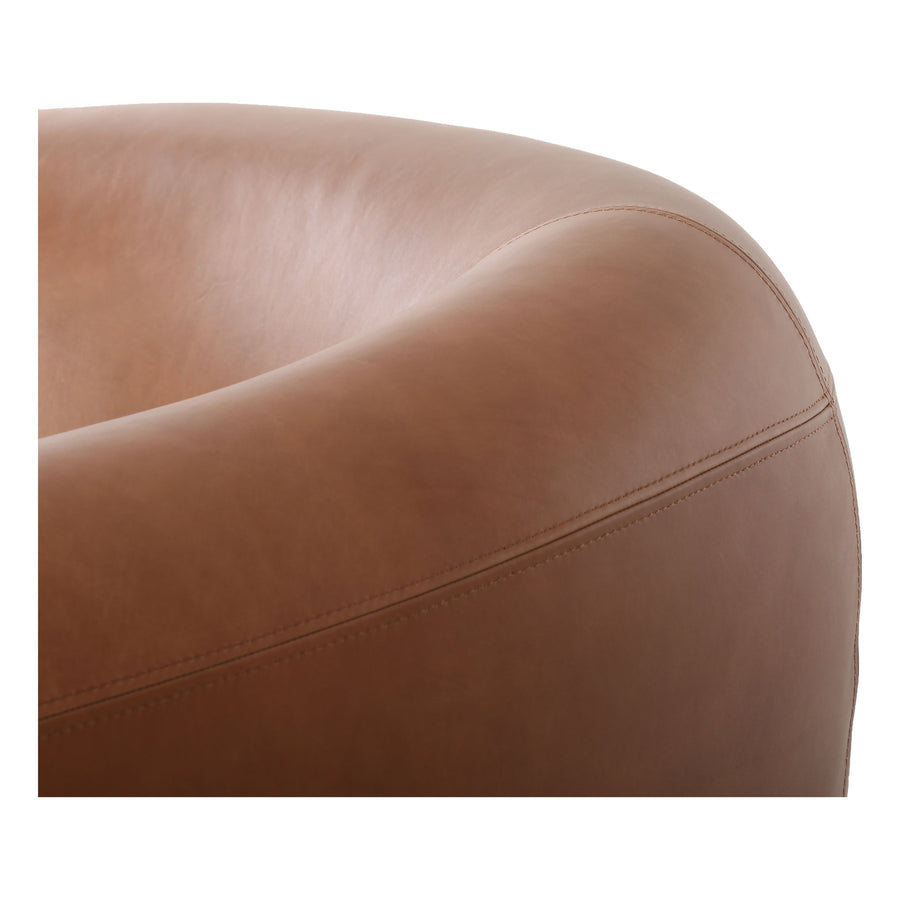 This updated take on the traditional tub chair pairs rich, camel-colored top-grain leather with solid ash to shape a sculpted seat with exaggerated depth. Amethyst Home provides interior design, new construction, custom furniture, and area rugs in the Washington metro area.