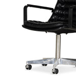 Pared back and fashion-forward. Inspired by chic midcentury offices, black top-grain leather pairs with iron arms and a shiny aluminum base. Added casters offer ease in the modern workplace. Height not adjustable. Amethyst Home provides interior design, new construction, custom furniture, and area rugs in the Miami metro area.