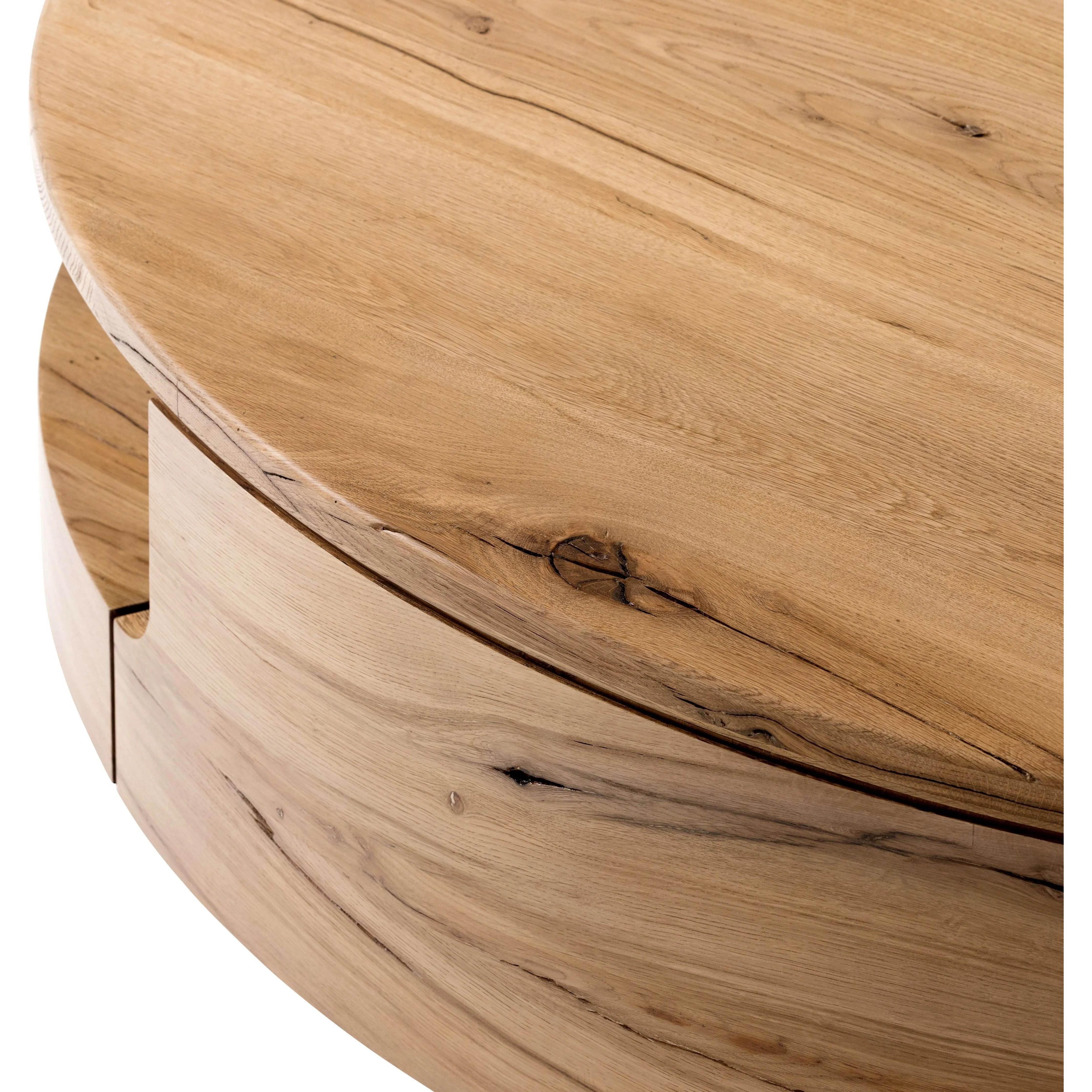 Designed in partnership with longtime Four Hands collaborator Thomas Bina and Brazilian designer Ronald Sasson. A rounded coffee table made from reclaimed French oak, features beautiful natural graining. Lower layer lightens the whole look, while brining the option for bonus storage or display.Collection: Bin Amethyst Home provides interior design, new home construction design consulting, vintage area rugs, and lighting in the Houston metro area.