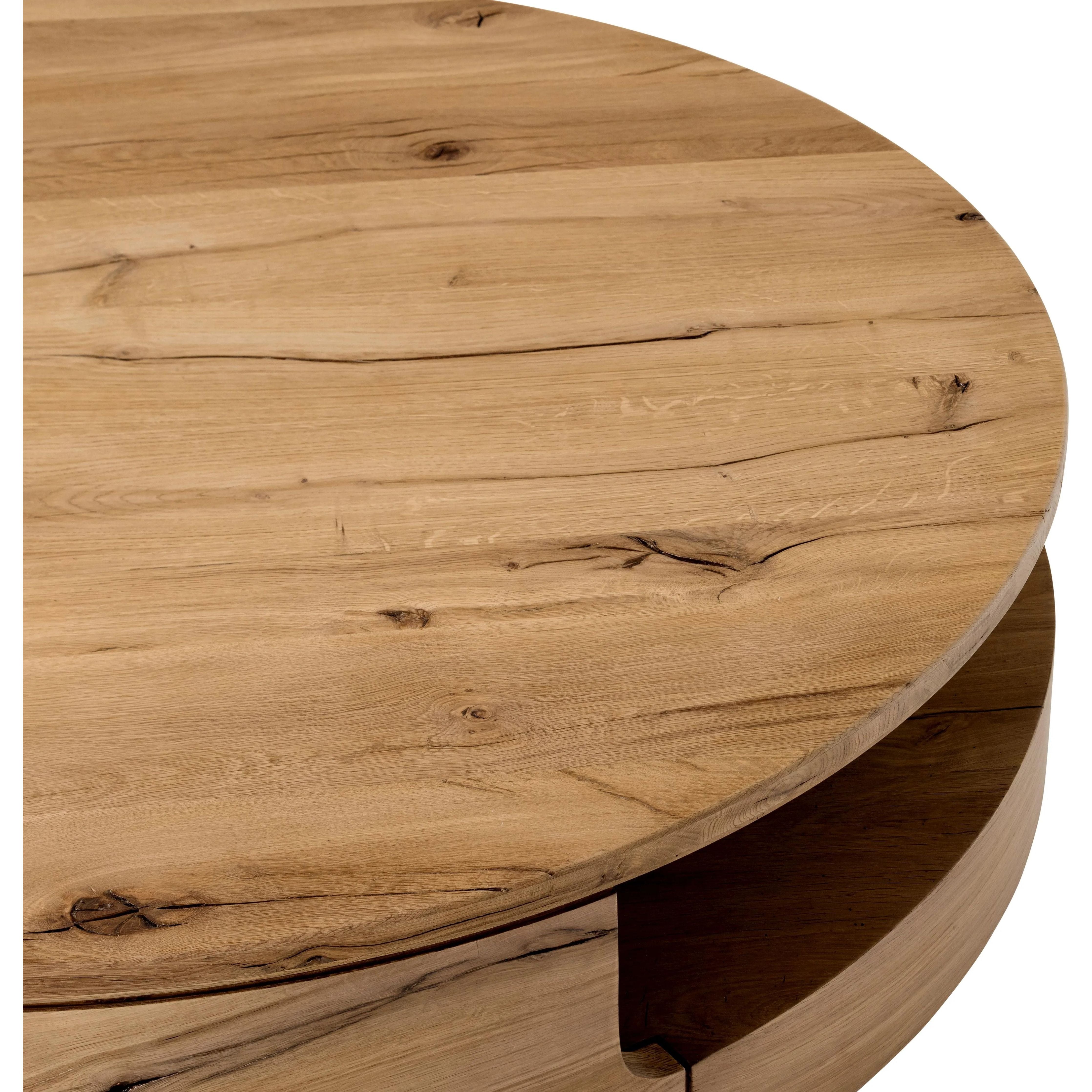 Designed in partnership with longtime Four Hands collaborator Thomas Bina and Brazilian designer Ronald Sasson. A rounded coffee table made from reclaimed French oak, features beautiful natural graining. Lower layer lightens the whole look, while brining the option for bonus storage or display.Collection: Bin Amethyst Home provides interior design, new home construction design consulting, vintage area rugs, and lighting in the Laguna Beach metro area.