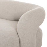 A fluid play on seating. This statement making sofa features subtle cutouts on the back with plush arms that hug the bench seat. Upholstered in a tight, wool-like textile for a polished look.Collection: Grayso Amethyst Home provides interior design, new home construction design consulting, vintage area rugs, and lighting in the Winter Garden metro area.