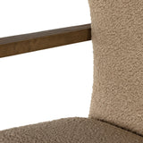 A comfort-driven desk chair features soft, textural upholstery in a versatile camel, framed by solid ash arms. A height-adjustable swivel base with casters makes for ease in the modern office. Amethyst Home provides interior design, new home construction design consulting, vintage area rugs, and lighting in the Los Angeles metro area.