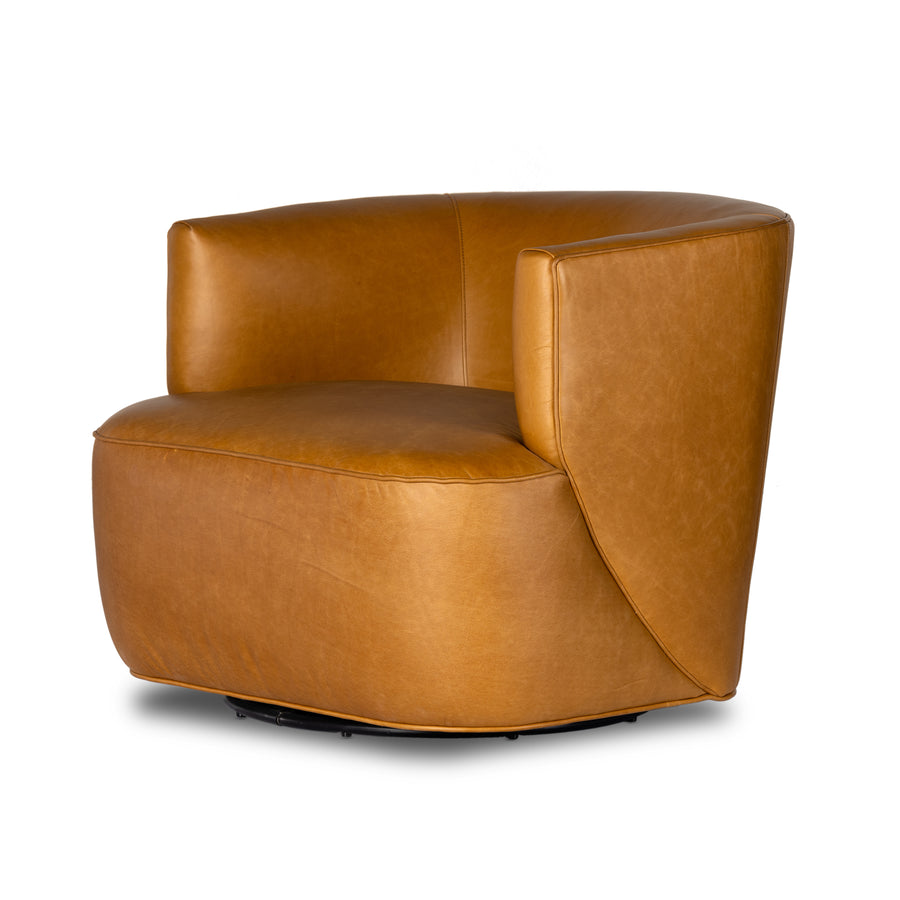 Supple, camel-colored top-grain leather hugs the curves of this modern-shaped seat, featuring a hidden 360-degree swivel. Amethyst Home provides interior design, new construction, custom furniture, and area rugs in the San Diego metro area.