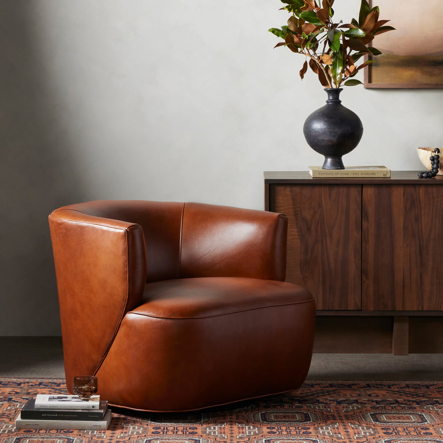 Sultry and sensible. Warm top-grain leather hugs the curves of modern-minded seating, with a hidden swivel for a functional touch. Amethyst Home provides interior design, new construction, custom furniture and area rugs in the Charlotte metro area