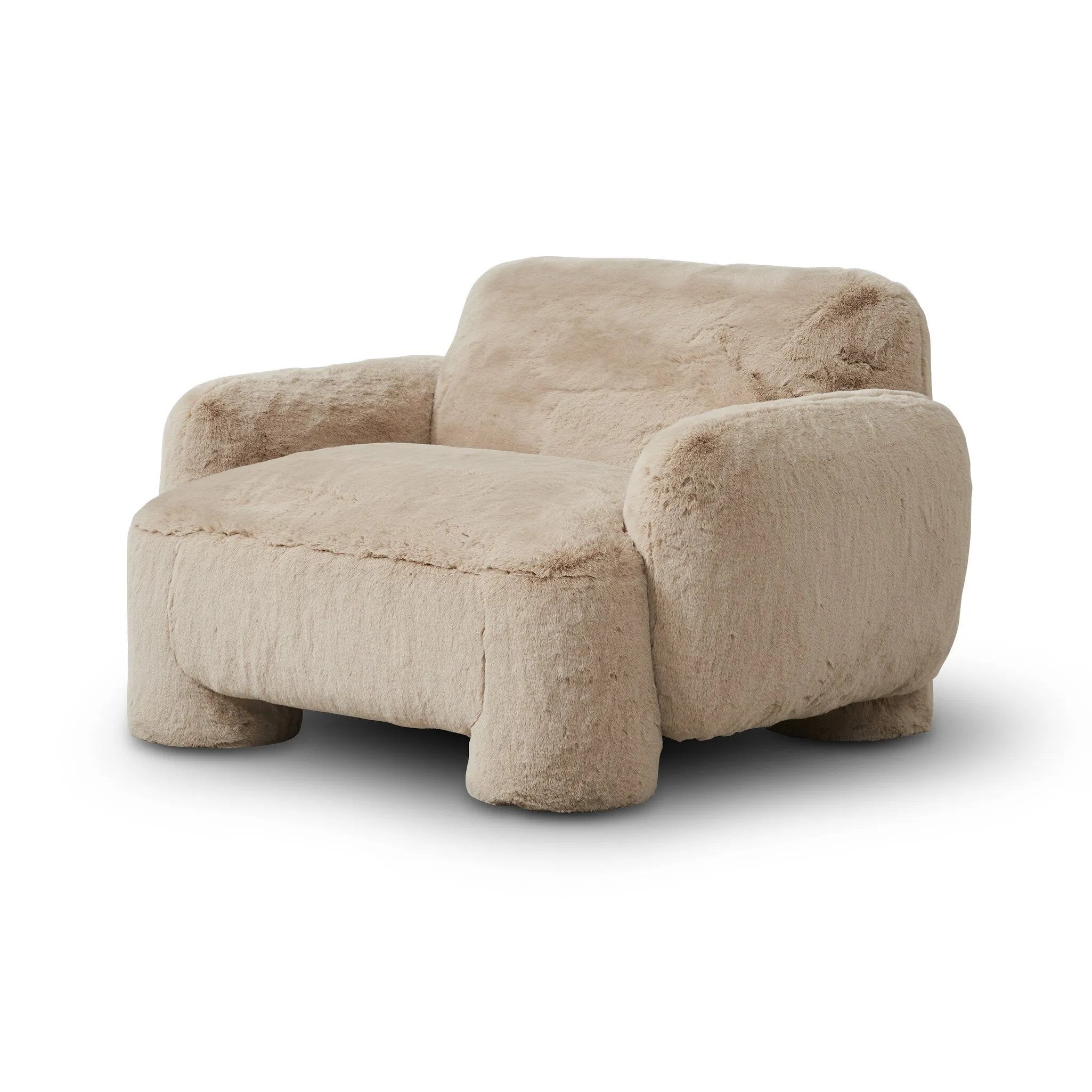 Oversized and modern, this arm chair is a statement piece whether styled alone or with an existing living room setup. The neutral faux fur covering subdues bold arms and cylindrical legs. With spring suspension in the seat cushion and webbed suspension in the back, the piece is designed with durability and comfort in mind.Collection: Carnegi Amethyst Home provides interior design, new home construction design consulting, vintage area rugs, and lighting in the Charlotte metro area.