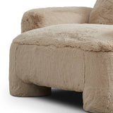Oversized and modern, this arm chair is a statement piece whether styled alone or with an existing living room setup. The neutral faux fur covering subdues bold arms and cylindrical legs. With spring suspension in the seat cushion and webbed suspension in the back, the piece is designed with durability and comfort in mind.Collection: Carnegi Amethyst Home provides interior design, new home construction design consulting, vintage area rugs, and lighting in the Miami metro area.