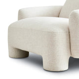 Oversized and modern, this arm chair is a statement piece whether styled alone or with an existing living room setup. The cream basketweave covering subdues bold arms and cylindrical legs. With spring suspension in the seat cushion and webbed suspension in the back, the piece is designed with durability and comfort in mind.Collection: Carnegi Amethyst Home provides interior design, new home construction design consulting, vintage area rugs, and lighting in the Tampa metro area.