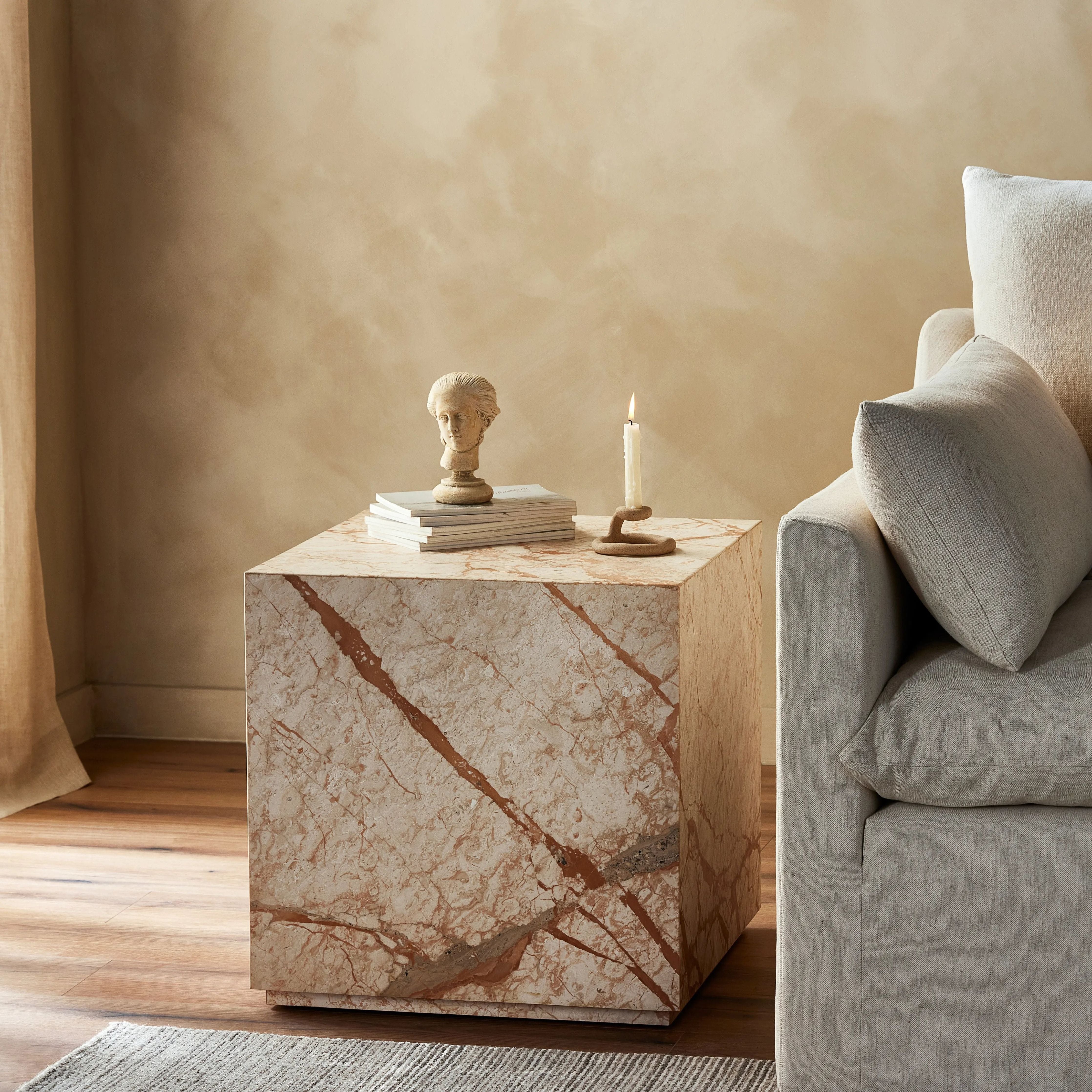 Taupe marble shapes a cubed, plinth-style end table that can be styled just about anywhere.Collection: Elemen Amethyst Home provides interior design, new home construction design consulting, vintage area rugs, and lighting in the Dallas metro area.