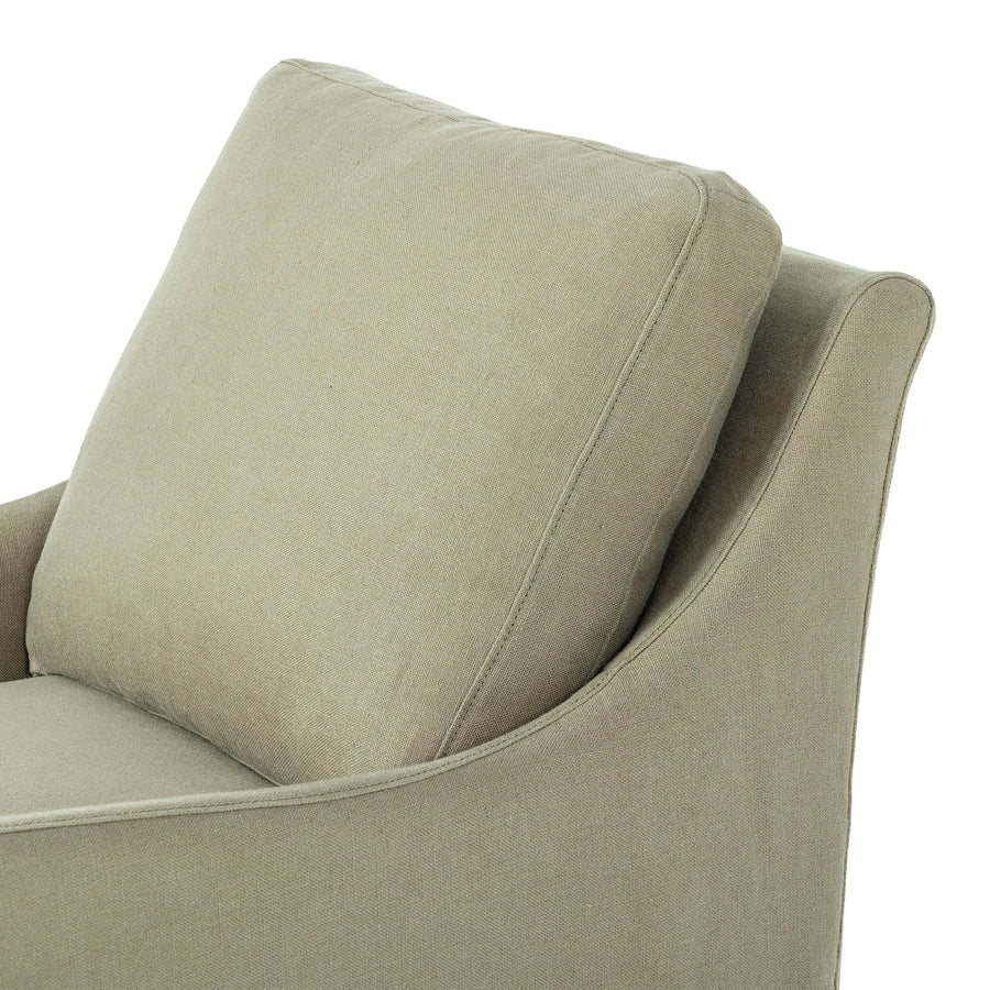 This 360-degree swivel chair is defined by slightly sloping, flared arms and a floor-length slipcover. Finished in a soft, tight weave slipcover for a traditional style. Durable and soft to the touch, Libeco™-sourced linens are artisan-made and free of toxic chemicals. Slipcovered styles are fully removable and machine-washable for easy care. Amethyst Home provides interior design, new home construction design consulting, vintage area rugs, and lighting in the Park City metro area.