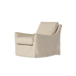 This 360-degree swivel chair is defined by slightly sloping, flared arms and a floor-length slipcover. Finished in a soft, tight weave slipcover for a traditional style. Durable and soft to the touch, Libecoâ„¢-sourced linens are artisan-made and free of toxic chemicals. Slipcovered styles are fully removable and machine-washable for easy care. Amethyst Home provides interior design, new construction, custom furniture and area rugs in the Seattle metro area