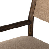 Mixed materials place a modern twist on the sling-back armchair. A solid oak frame forms rounded dowel legs for a touch of traditionalism, with performance fabric perfect for everyday dining. Amethyst Home provides interior design, new construction, custom furniture and area rugs in the Alpharetta metro area