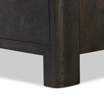 Topped with a thick plank of solid oak, this extra-wide nightstand blends modern lines and warm character with two roomy drawers, slightly curved corners, and solid square legs. Seamless drawer fronts have a push-latch mechanism. Made from solid oak and veneer in a smoky black finish.Collection: Bolto Amethyst Home provides interior design, new home construction design consulting, vintage area rugs, and lighting in the Laguna Beach metro area.