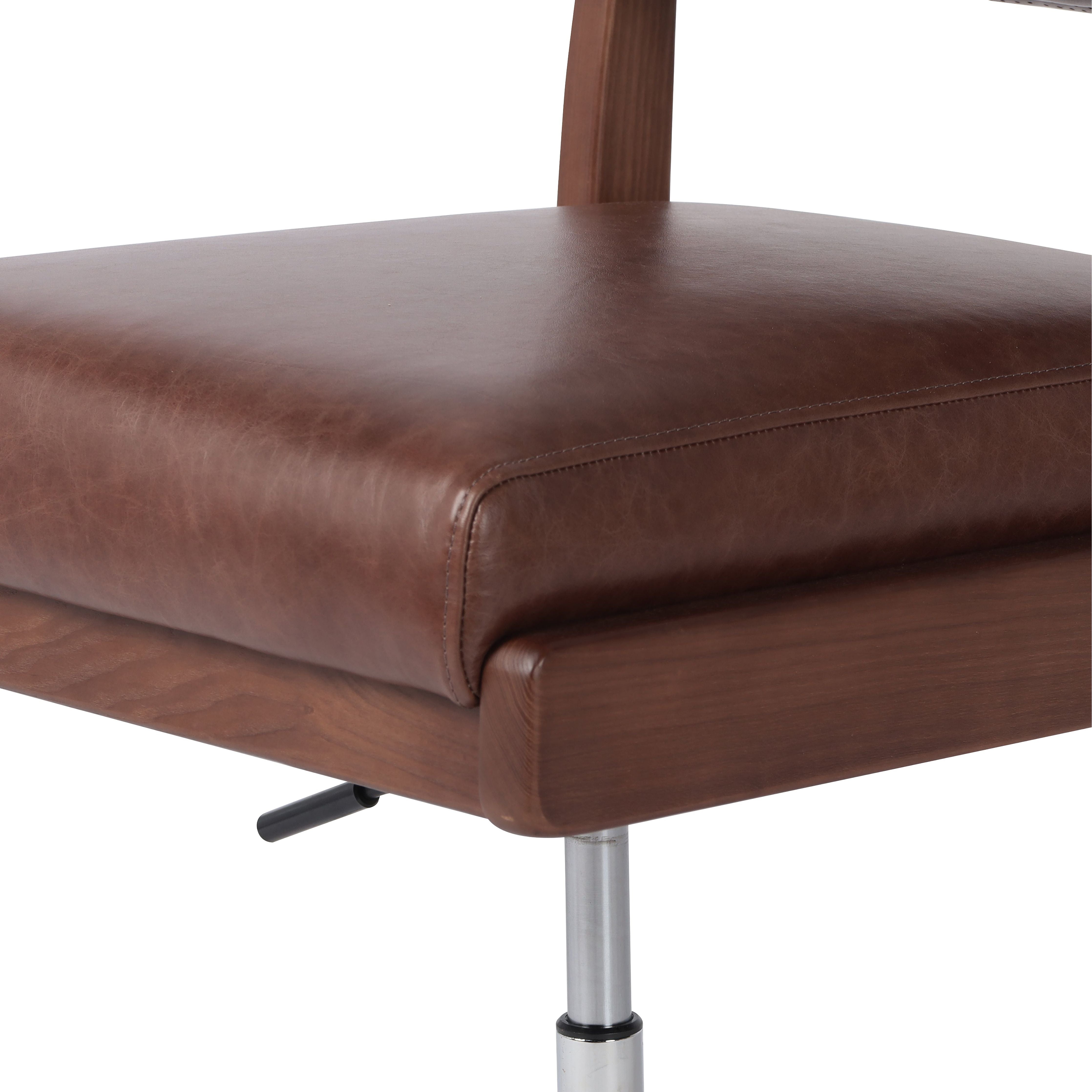 An armless top-grain leather seat and bolster pair with a wooden frame for an understated modern look with a hint of midcentury influence. Amethyst Home provides interior design, new construction, custom furniture, and area rugs in the Austin metro area.
