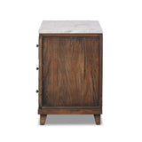 Capturing the charm of vintage French storage, this solid mango wood nightstand stands tall with a polished marble top and softened ogee edges. Three spacious drawers are fitted with classic brass-button hardware. Natural marks and cracks are characteristic of the reclaimed wood.Collection: Harmo Amethyst Home provides interior design, new home construction design consulting, vintage area rugs, and lighting in the Charlotte metro area.