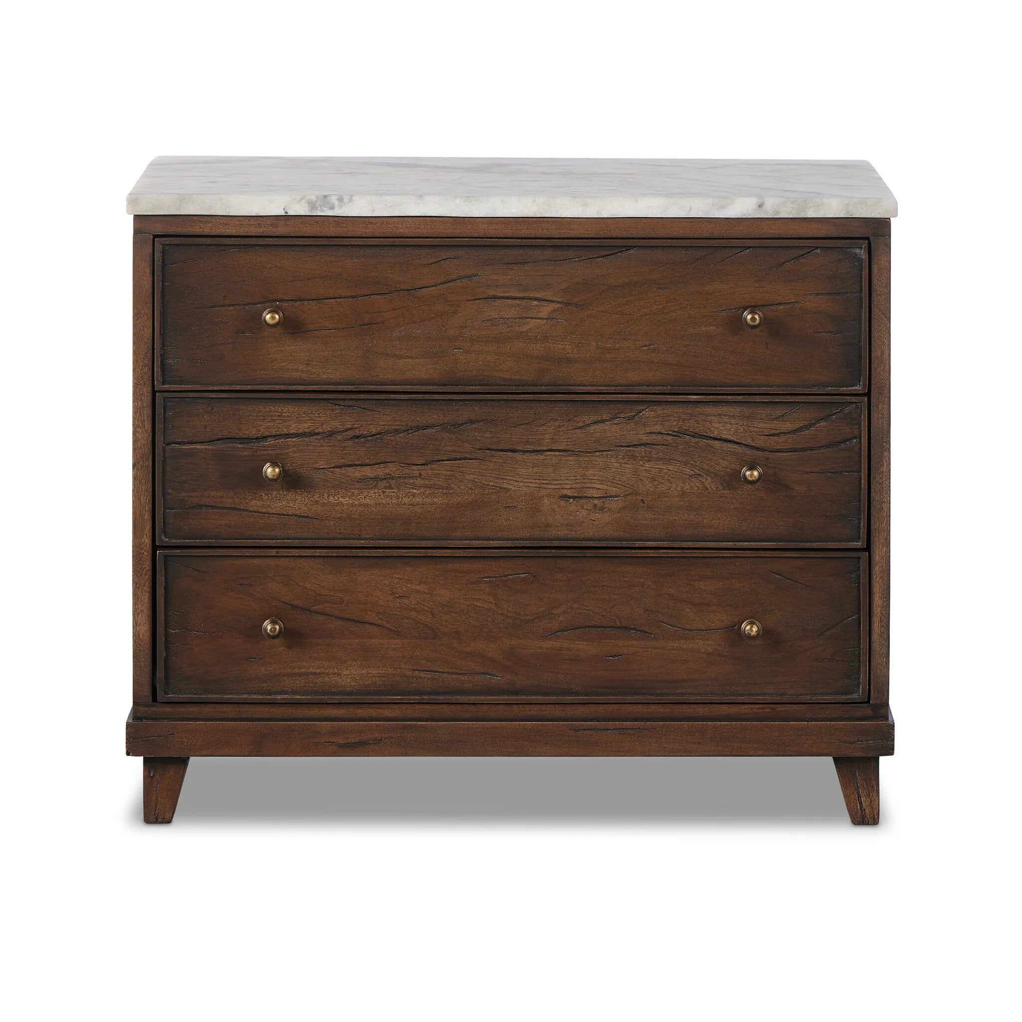Capturing the charm of vintage French storage, this solid mango wood nightstand stands tall with a polished marble top and softened ogee edges. Three spacious drawers are fitted with classic brass-button hardware. Natural marks and cracks are characteristic of the reclaimed wood.Collection: Harmo Amethyst Home provides interior design, new home construction design consulting, vintage area rugs, and lighting in the Newport Beach metro area.