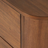 Seasoned brown acacia forms a curved pedestal base, bringing gentle curves to a classic nightstand shape. Amethyst Home provides interior design, new construction, custom furniture, and area rugs in the Tampa metro area.