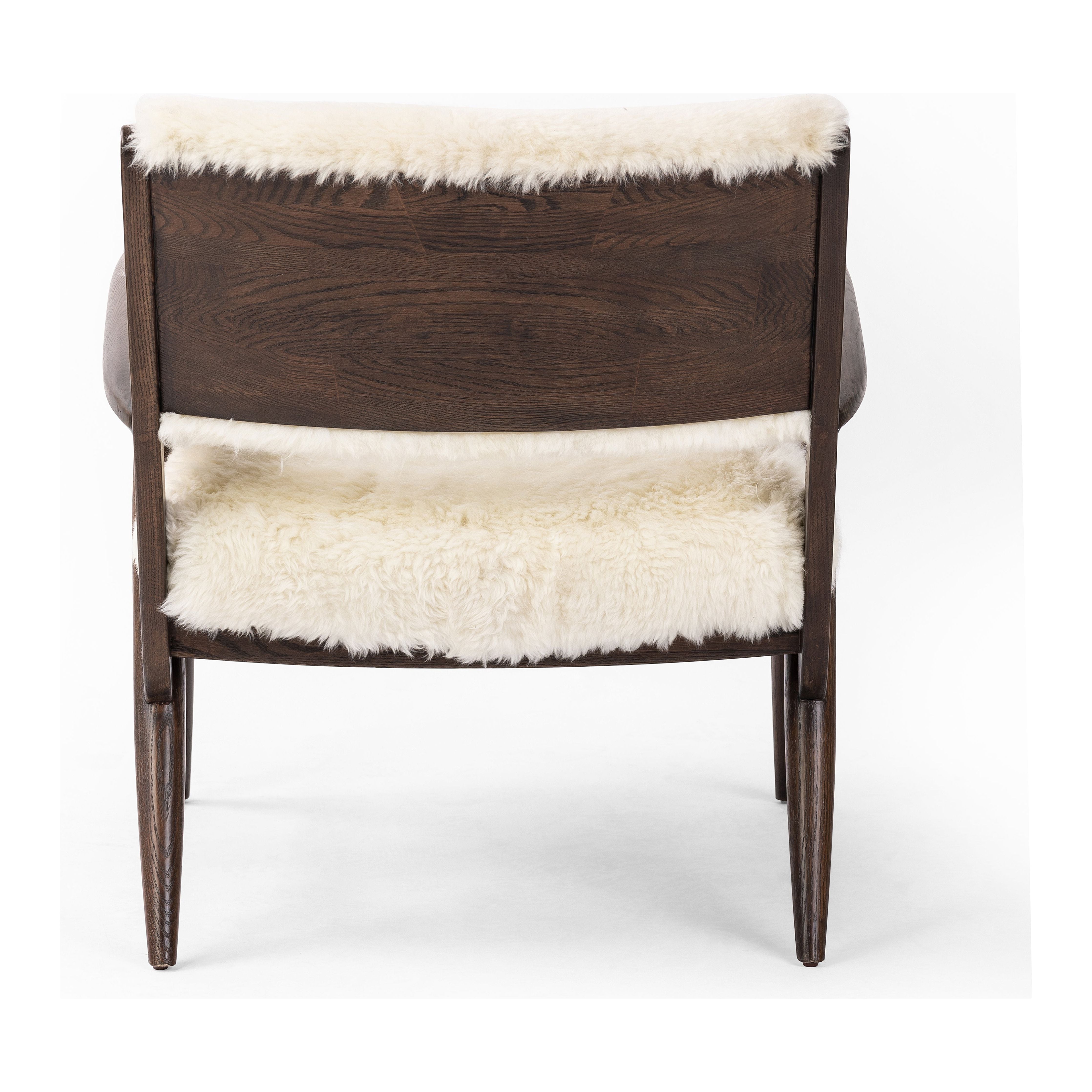 A modern take on the vintage school chair, upholstered in plush cream shearling of 100% sheepskin. Perfect as an accent chair or in pairs. Amethyst Home provides interior design, new construction, custom furniture, and area rugs in the Alpharetta metro area.