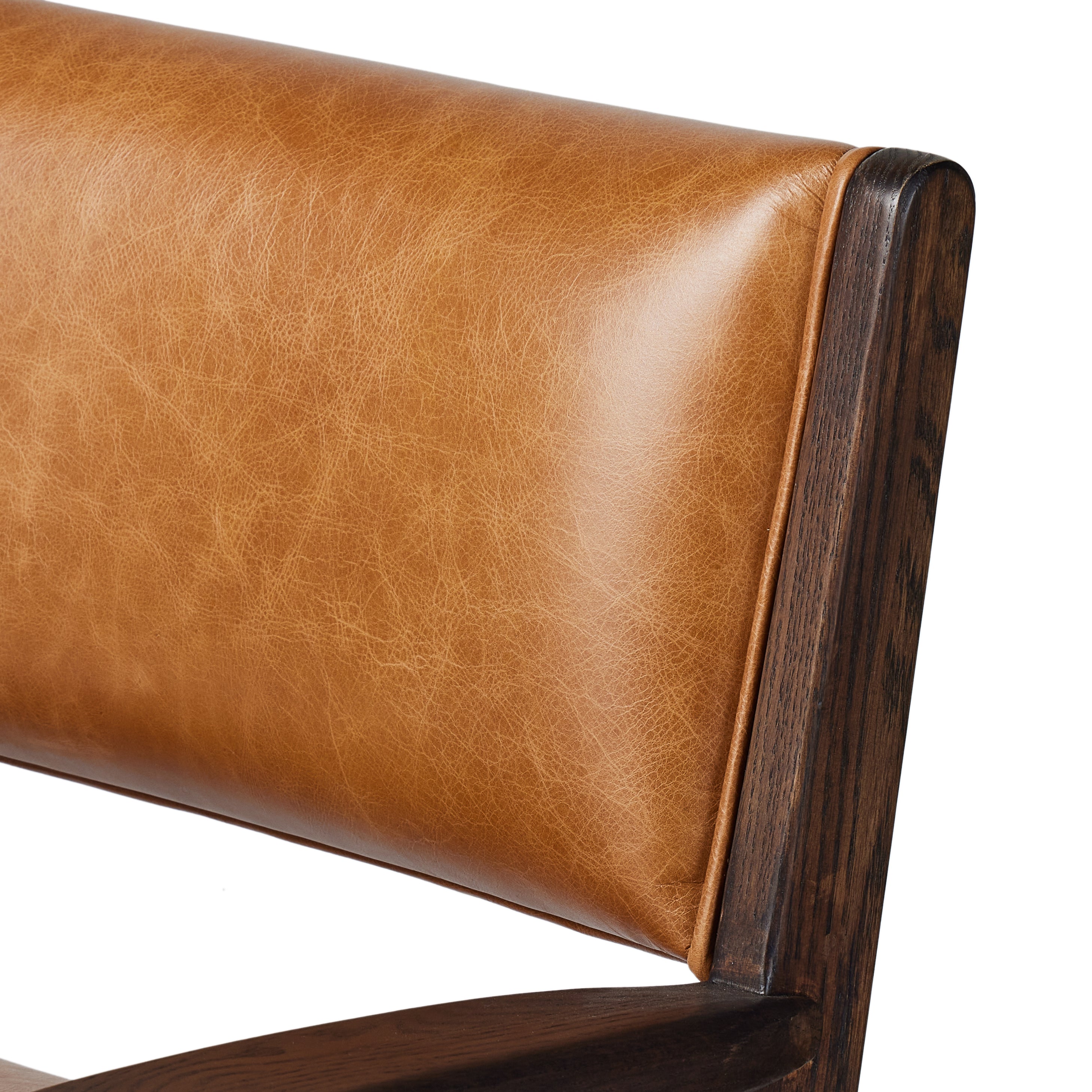 A modern take on the vintage school chair, upholstered in butterscotch top-grain leather exclusive to Four Hands. Amethyst Home provides interior design, new home construction design consulting, vintage area rugs, and lighting in the San Diego metro area.