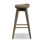 A fresh spin on bar seating, the parawood Paramore Swivel Counter Stool is finished in a deep charcoal for a clean, sleek look. The stool is topped with a swivel. Amethyst Home provides interior design, new home construction design consulting, vintage area rugs, and lighting in the Austin metro area.