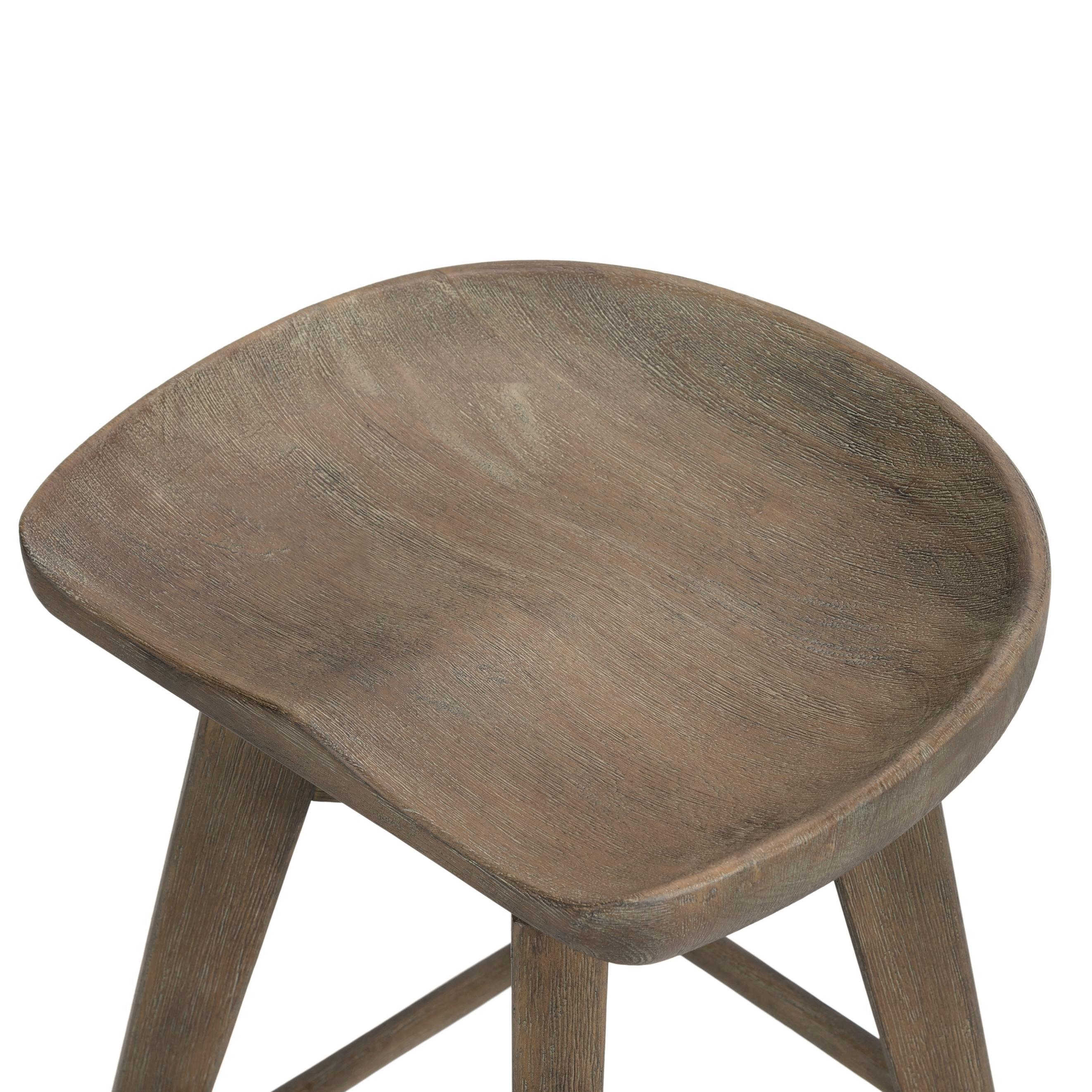 A fresh spin on bar seating, the parawood Paramore Swivel Counter Stool is finished in a deep charcoal for a clean, sleek look. The stool is topped with a swivel. Amethyst Home provides interior design, new home construction design consulting, vintage area rugs, and lighting in the Los Angeles metro area.